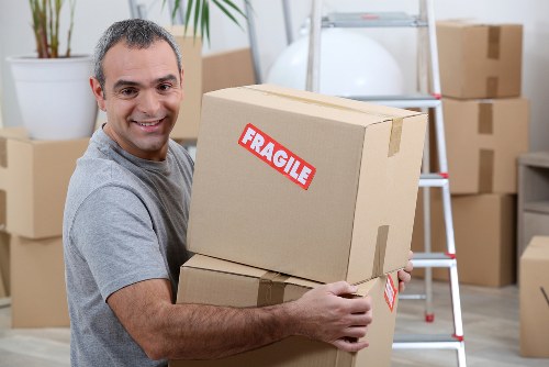 Removal team helping with a move in Wandsworth street