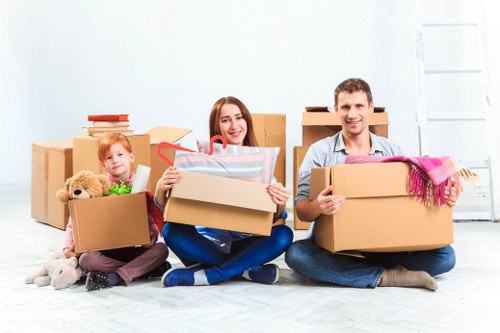 Team loading items safely into a moving van