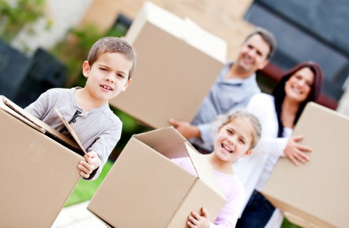 Professional movers handling household items in a Wandsworth flat
