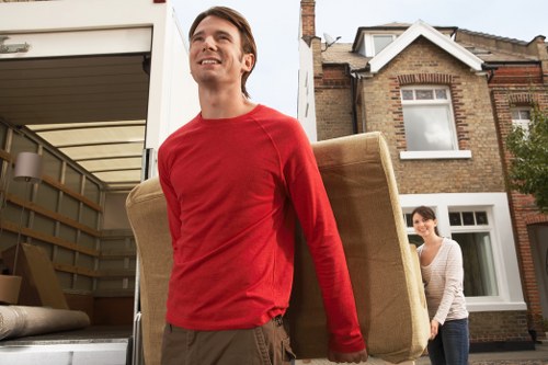 Local removals van outside a Wandsworth property with household items