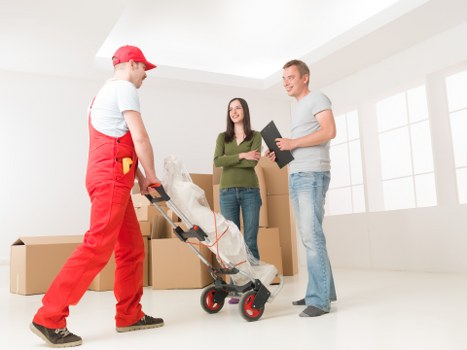 Boxes and furniture being loaded for a local move in South West London