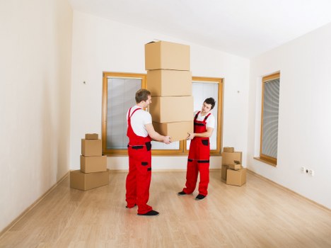 Careful furniture moving through a Wandsworth flat entrance